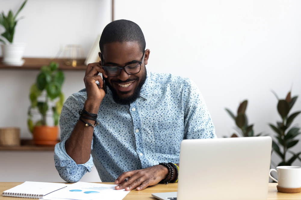 Happy afro american businessman to symbolized Payment Processing Merchant Account