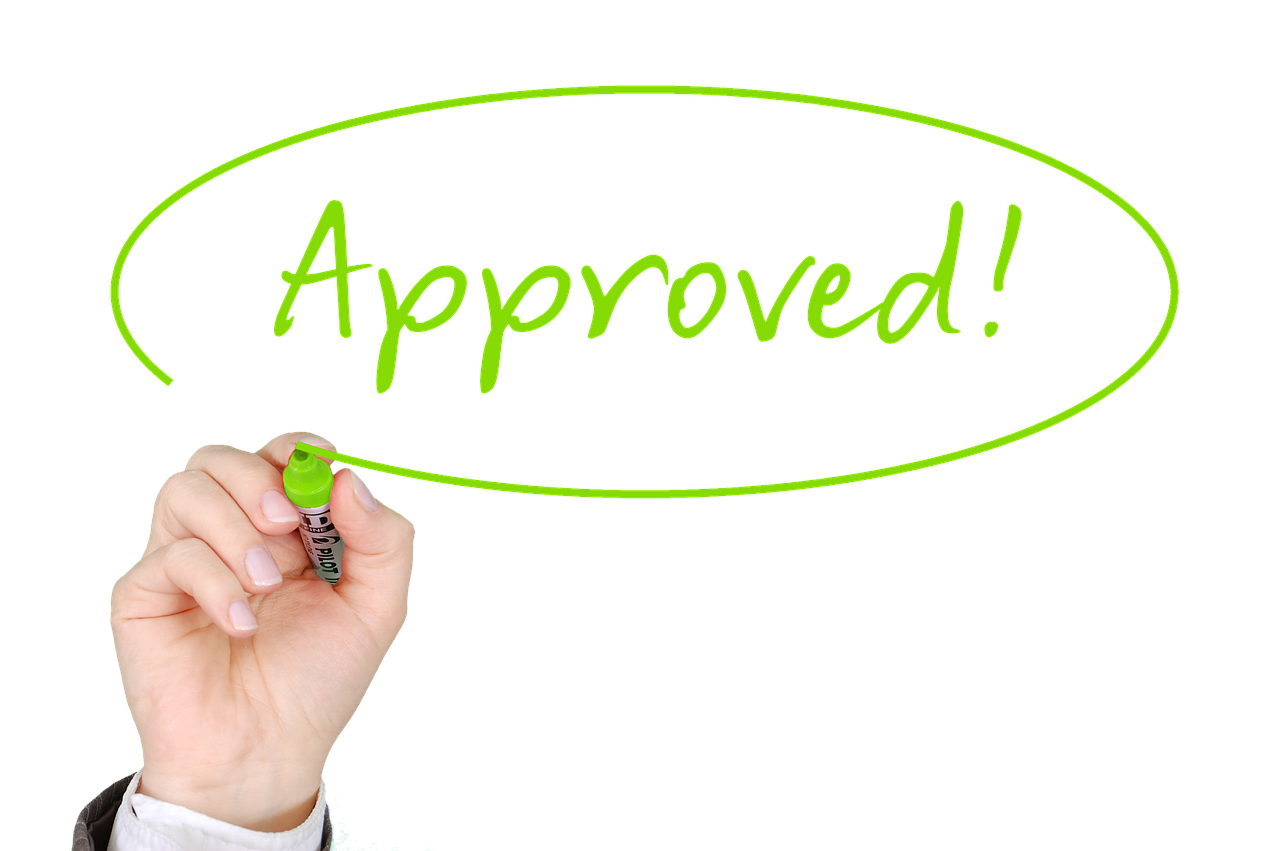 The word approved written on a board with a green marker, representing fast approvals for Adult Merchant Business Accounts