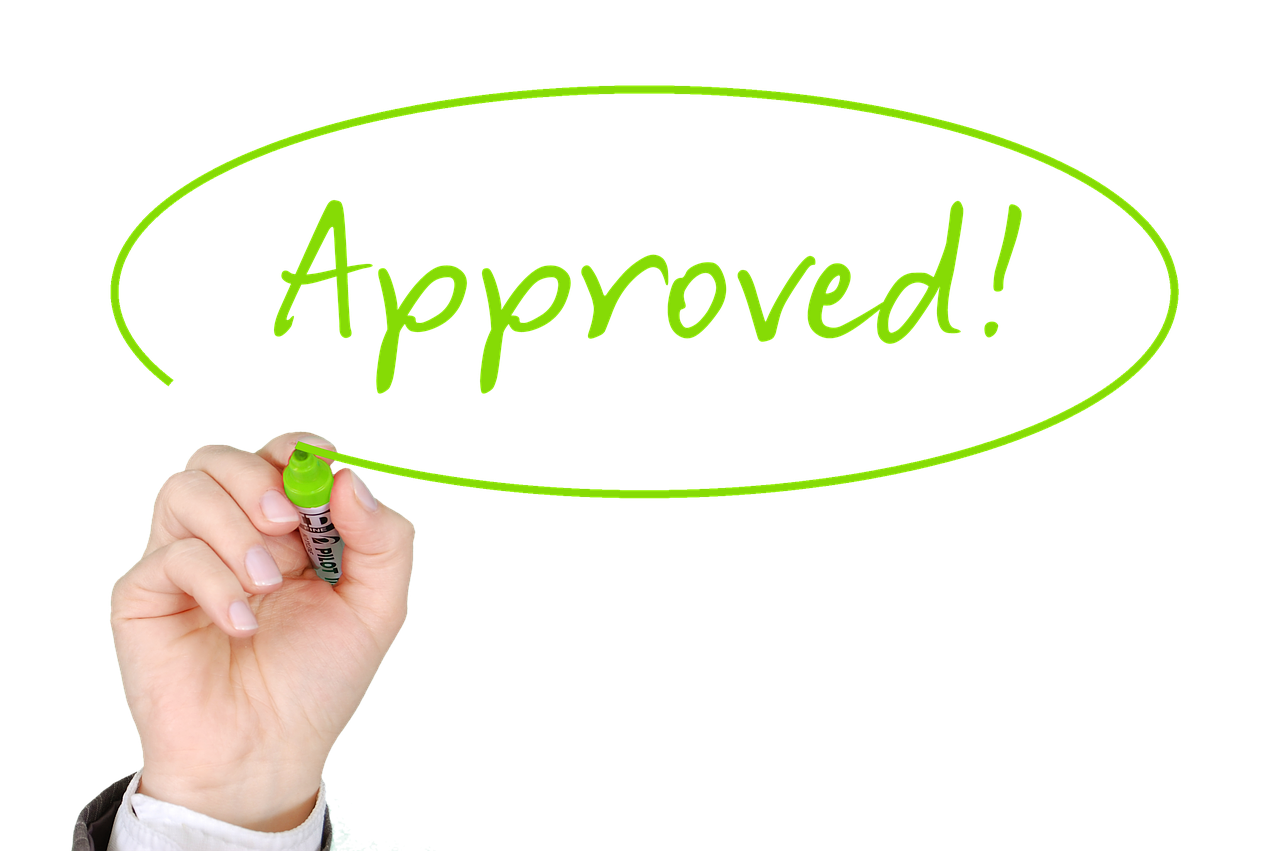 The word approved written on a board with a green marker, representing fast approvals for Adult Merchant Business Accounts