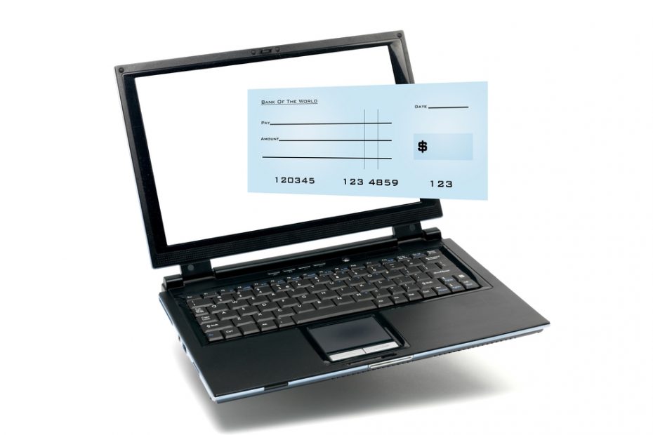 A laptop with a blank check coming out of the laptop to symbolize an e-check.