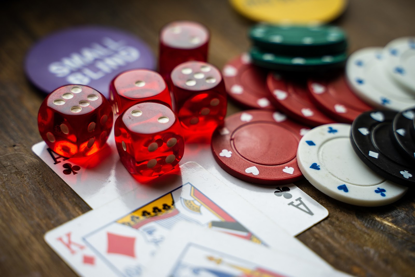 Different games laid out on table to symbolize requirements for gaming payment processing