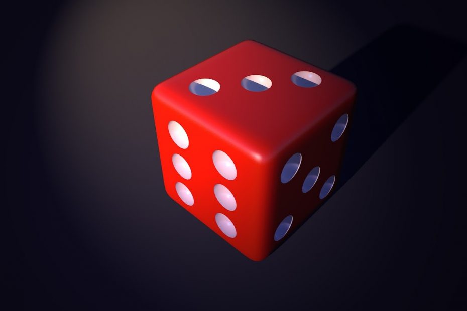 Red die to symbolize gaming payment processing