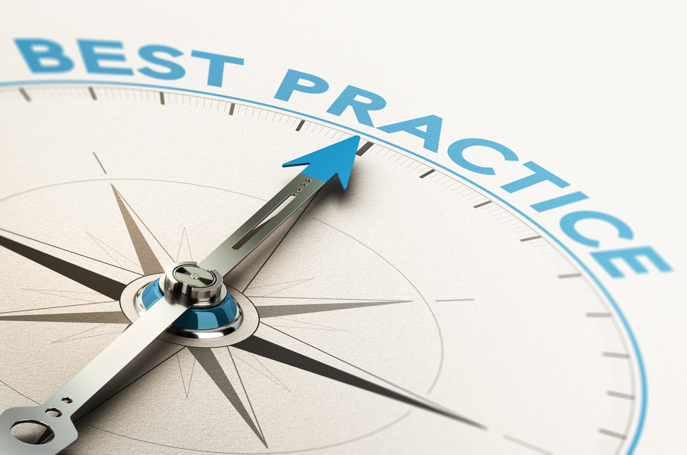 A compass with a needle pointing to the word best practice in blue.